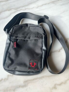True Religion Black Messenger Bag with Red Logo